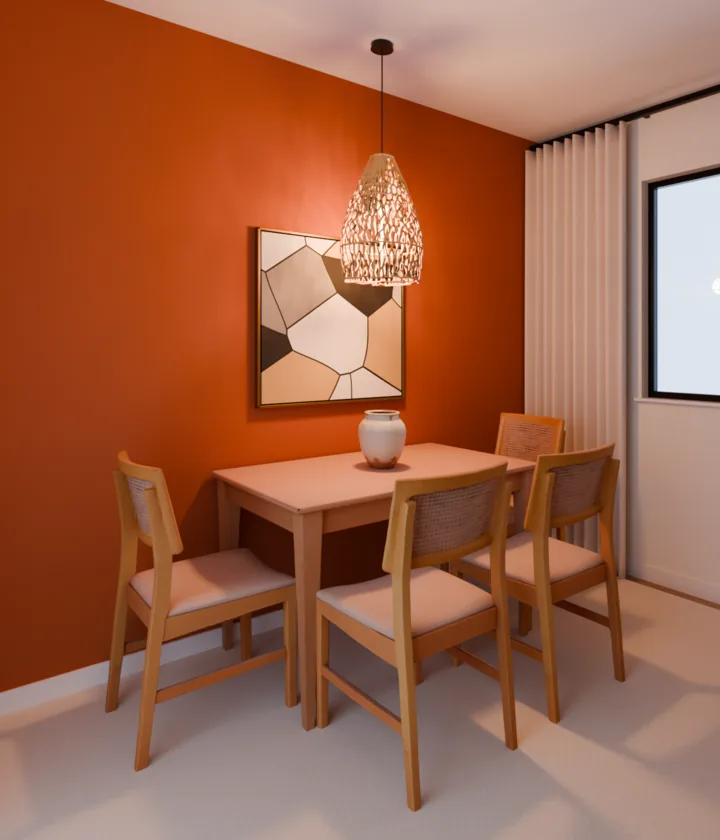 A mesma parede terracota, a mesma mesa e as mesmas cadeiras; acima da mesa, um quadro abstrato quadrado em bege, cinza, pêssego e marrom, com moldura fina dourada, menor que a mesa e mais perto dela