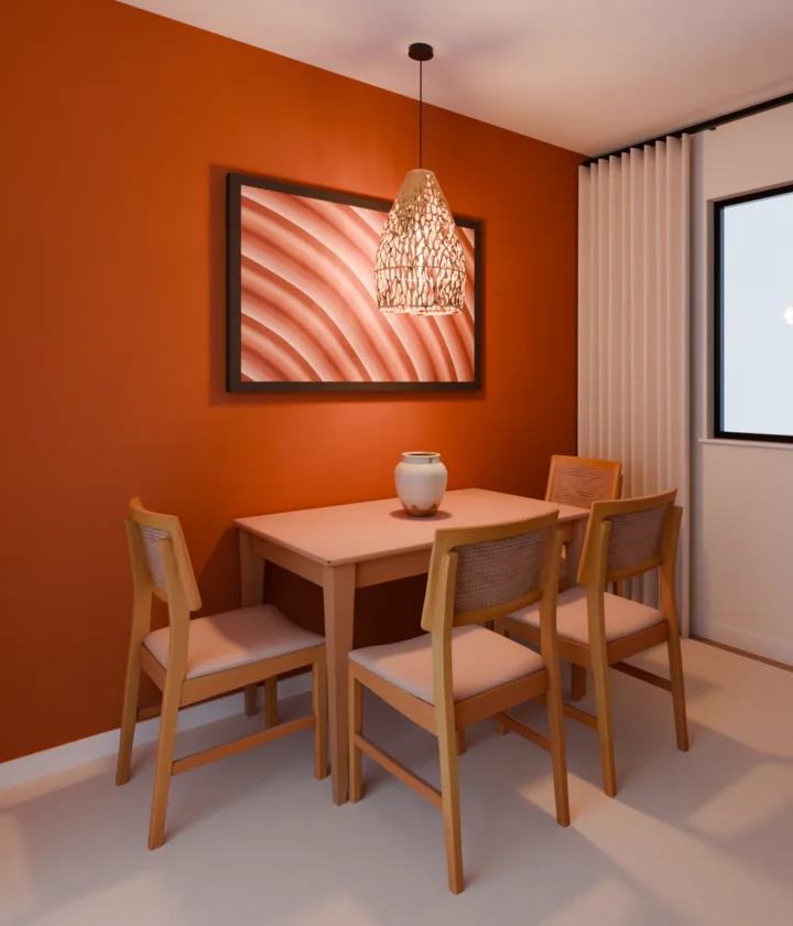 Parede terracota com mesa de madeira e quatro cadeiras; acima da mesa, um quadro de faixas terrosas largo como a mesa e pendurado alto, perto do pendente de rattan